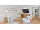 Bright living room featuring new furniture, decor and recessed lighting at 1062 Sasha Ln, Roswell, GA 30075