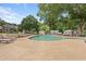 Community pool surrounded by lounge chairs offers a relaxing retreat on sunny days at 1062 Sasha Ln, Roswell, GA 30075