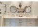 Contemporary bathroom with double vanity, modern fixtures, and round mirrors at 236 Ridge Nw Ave, Marietta, GA 30064