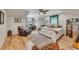 Spacious bedroom with wood floors, a ceiling fan, a leather chair, and plenty of room to work at 236 Ridge Nw Ave, Marietta, GA 30064