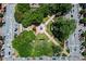 Aerial view of downtown park with fountain, walking paths and lush foliage at 236 Ridge Nw Ave, Marietta, GA 30064