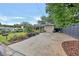 Brick home with a spacious driveway and lush landscaping creating a welcoming outdoor space at 236 Ridge Nw Ave, Marietta, GA 30064