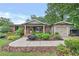 Inviting brick home featuring a lush front garden and walkway leading to the charming entrance at 236 Ridge Nw Ave, Marietta, GA 30064
