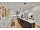 Open kitchen with granite countertops, stainless appliances, large island, and pendant lighting at 236 Ridge Nw Ave, Marietta, GA 30064