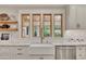 Kitchen sink with farmhouse style and natural light from the windows above at 236 Ridge Nw Ave, Marietta, GA 30064