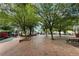 Picturesque public square with lush trees and brick pathways provides a peaceful gathering space for community events at 236 Ridge Nw Ave, Marietta, GA 30064