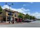 Vibrant street view with a mix of brick buildings, restaurants, and outdoor seating, perfect for exploring local businesses at 236 Ridge Nw Ave, Marietta, GA 30064