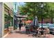 Charming street view featuring outdoor dining and local shops, perfect for enjoying the neighborhood atmosphere at 236 Ridge Nw Ave, Marietta, GA 30064