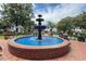 Beautiful town square with a classic water fountain, green spaces, and benches for relaxing in a serene setting at 236 Ridge Nw Ave, Marietta, GA 30064