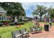 Lively town square with a grassy area, benches, American flags, and a gazebo, ideal for community gatherings at 236 Ridge Nw Ave, Marietta, GA 30064