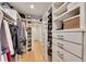 Spacious walk-in closet with custom shelving and organization system at 236 Ridge Nw Ave, Marietta, GA 30064