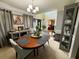 Charming dining room with stylish furnishings, creating a welcoming atmosphere for meals at 25 Jessamine Trail Trl, Lawrenceville, GA 30046