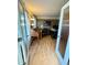 Cozy home office space with wood laminate flooring, featuring natural light at 25 Jessamine Trail Trl, Lawrenceville, GA 30046