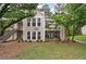 Charming condo with a stone chimney and a welcoming front yard at 3408 Lake Pointe Cir, Roswell, GA 30075