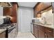 Well-equipped kitchen with stainless steel appliances and ample counter space at 3408 Lake Pointe Cir, Roswell, GA 30075