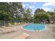 Community pool with lounge chairs offering a relaxing outdoor space for residents at 3408 Lake Pointe Cir, Roswell, GA 30075