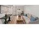Finished basement features a seating area with hardwood floors and bright lighting at 3181 Pennington Sw Cir, Atlanta, GA 30354