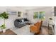 Cozy living room features hardwood floors, bright light, and contemporary decor at 3181 Pennington Sw Cir, Atlanta, GA 30354