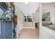 Inviting foyer with a view of the dining room and staircase, providing a warm welcome at 1005 Wellers Ct, Roswell, GA 30076
