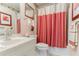 Well-lit bathroom features a shower-tub combo at 1115 Hunters Creek Ct, Lawrenceville, GA 30043
