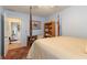 Bedroom featuring a four-poster bed, bookcase, and carpet at 1115 Hunters Creek Ct, Lawrenceville, GA 30043