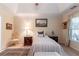 Bright bedroom with neutral colors, natural light, wood floors, and an area rug at 1115 Hunters Creek Ct, Lawrenceville, GA 30043