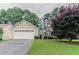 Charming single-Gathering home featuring an attached garage and well-maintained front lawn at 1115 Hunters Creek Ct, Lawrenceville, GA 30043
