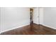 Bedroom with hardwood floors, freshly painted walls and trim, and closet at 1381 Benteen Way Southeast, Atlanta, GA 30315