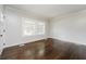 Living room with hardwood floors, fresh paint, and natural light at 1381 Benteen Way Southeast, Atlanta, GA 30315