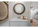 Updated bathroom features a white vanity, large mirror, and an additional view to a bedroom at 1398 Woodland Ave, Atlanta, GA 30316