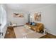 Bright living room with hardwood floors, neutral paint, and modern furnishings at 1398 Woodland Ave, Atlanta, GA 30316