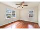 Inviting bedroom featuring hardwood floors and windows for natural light at 2329 Polar Rock Sw Ave, Atlanta, GA 30315