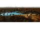 Picturesque aerial panorama featuring the Golf Club amidst a landscape of trees and blue lakes at 2343 Dawn Dr, Decatur, GA 30032