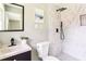 Stylish bathroom showcasing a walk-in shower with marble tile, and modern black hardware at 2343 Dawn Dr, Decatur, GA 30032