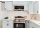 Kitchen featuring stainless steel appliances and light blue cabinets at 2343 Dawn Dr, Decatur, GA 30032