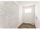 Finished room has new paint, one window and faux wood flooring at 2343 Dawn Dr, Decatur, GA 30032