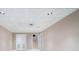 Finished basement with recessed lighting and access to the stairs and outside at 2717 Hearthstone Cir, Marietta, GA 30062