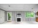 Finished basement with a fireplace, door to yard and a window at 2717 Hearthstone Cir, Marietta, GA 30062