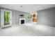 Finished basement with a modern fireplace and a view to the backyard at 2717 Hearthstone Cir, Marietta, GA 30062