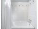 The bathroom features a shower and tub with decorative tile at 2717 Hearthstone Cir, Marietta, GA 30062
