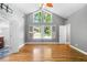 Bright, airy bedroom featuring large windows, hardwood floors, and a vaulted ceiling at 2717 Hearthstone Cir, Marietta, GA 30062