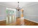 Dining room with hardwood floors, a chandelier, and open layout at 2717 Hearthstone Cir, Marietta, GA 30062