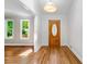 Bright foyer with hardwood floors and a decorative front door, providing a welcoming entrance at 2717 Hearthstone Cir, Marietta, GA 30062