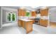 Bright eat-in kitchen featuring wooden cabinetry, stainless appliances, and light countertops at 2717 Hearthstone Cir, Marietta, GA 30062