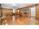 Classic living room showcasing wood paneling, hardwood floors, and ample natural light at 2717 Hearthstone Cir, Marietta, GA 30062