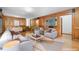 Inviting living room features wood paneling, built-in speakers, and stylish furnishings at 2717 Hearthstone Cir, Marietta, GA 30062