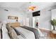 Staged Main bedroom has a ceiling fan and TV at 2717 Hearthstone Cir, Marietta, GA 30062