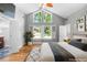 Tranquil bedroom with vaulted ceiling, lots of natural light and stylish decor at 2717 Hearthstone Cir, Marietta, GA 30062