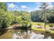 Scenic view of community pond with a bridge at 2717 Hearthstone Cir, Marietta, GA 30062