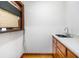 Utility area featuring hardwood floors and a stainless steel sink at 2717 Hearthstone Cir, Marietta, GA 30062